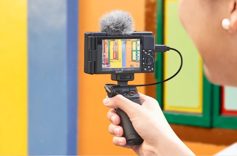 Photo of a vlogger using the Sony ZV-1 Camera